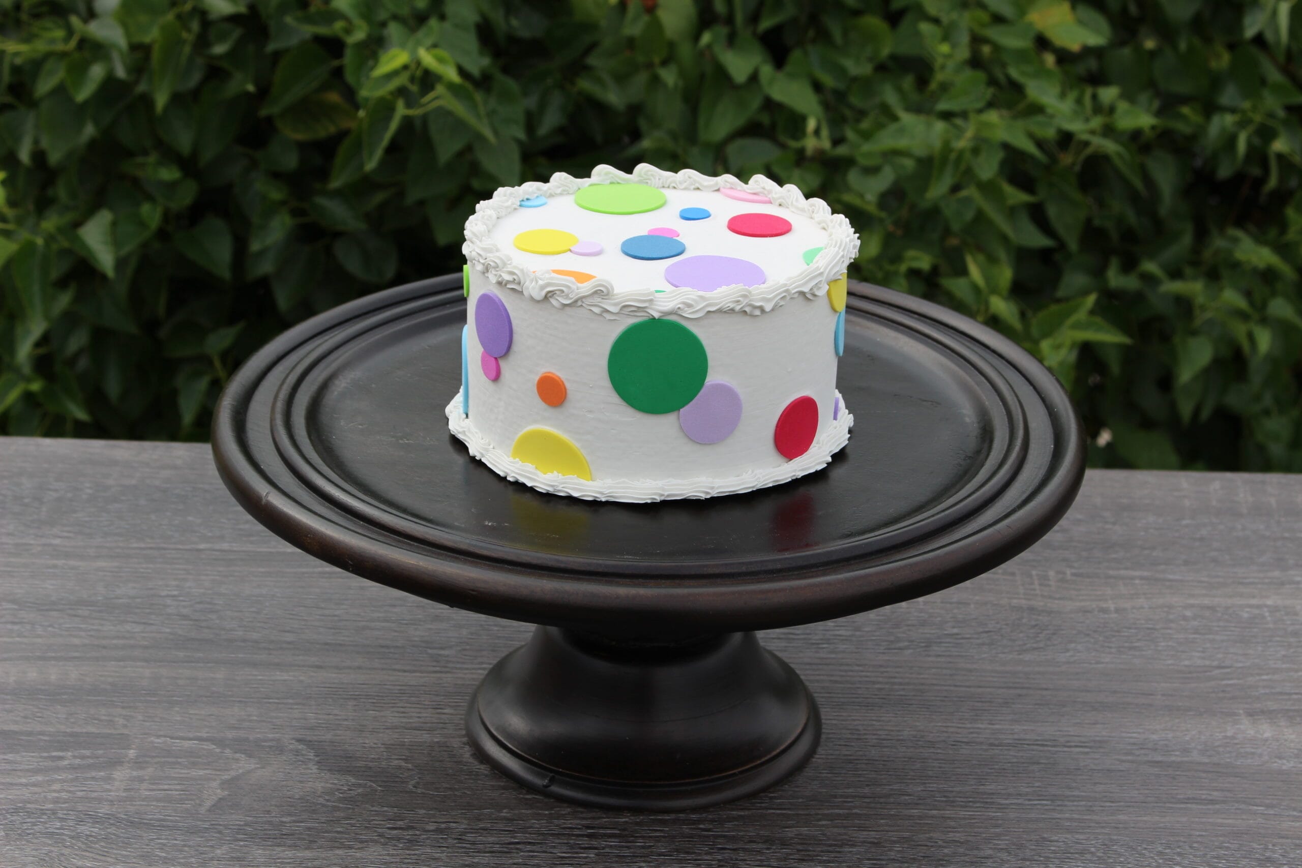 Fake Small Vanilla Frosted Cake with Multi-Color Polka Dots