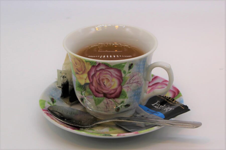 Fake Coffee - Black In Cup With Saucer