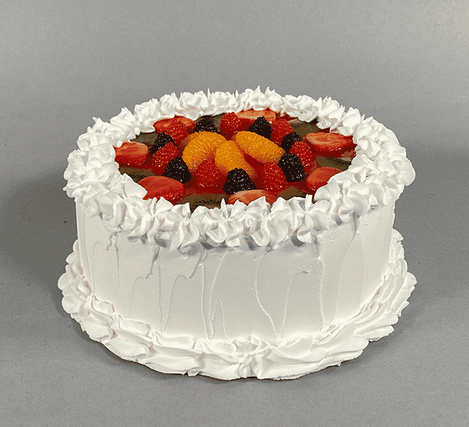 Fake Large Vanilla Frosted Cake with Fruit